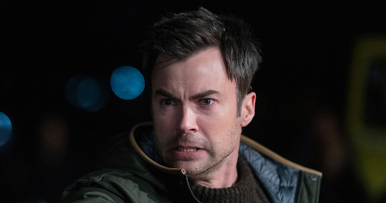 Matt Long holding a gun