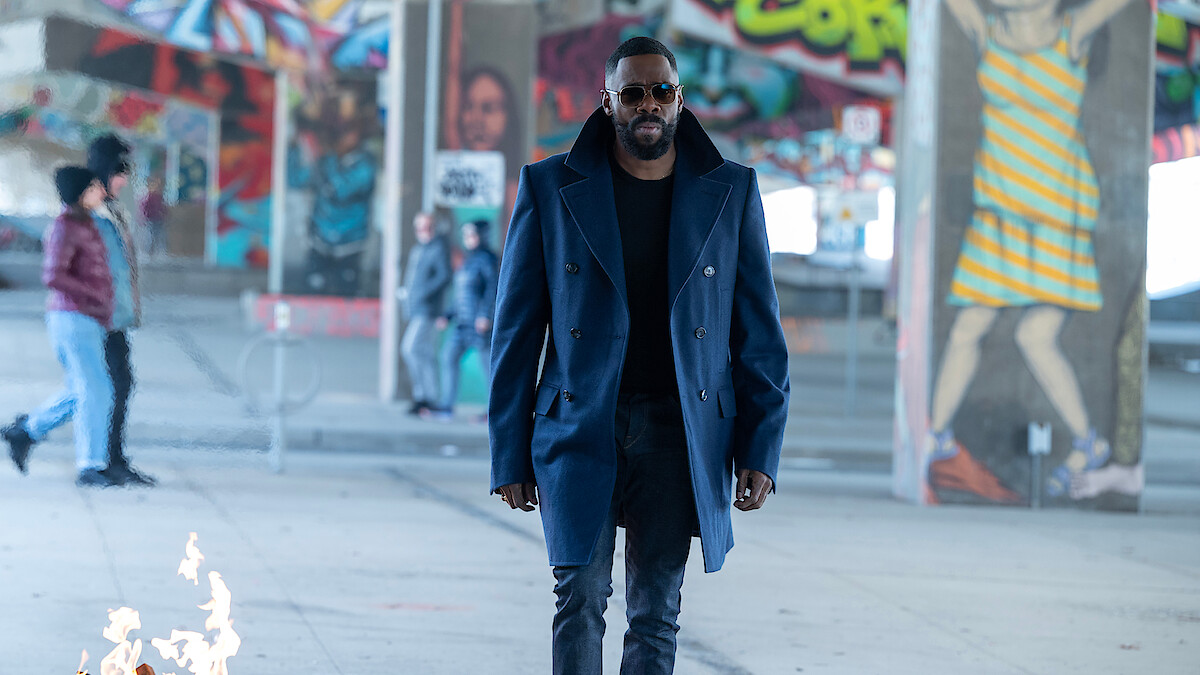 Colman Domingo as Muncie Daniels walks through an underpass covered in graffiti in 'The Madness.'