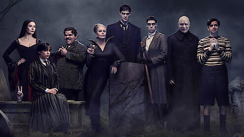 The Addams Family poses for a family portrait in 'Wednesday' Season 2