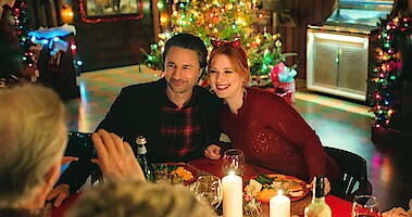 Alexandra Breckenridge as Mel Monroe and Martin Henderson as Jack Sheridan stand on a porch looking concerned in Season 5 of 'Virgin River.'