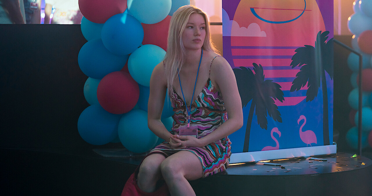 West Duchovny as Shannon Schaeffer sits alone at a party in Season 1 of 'Painkiller.'