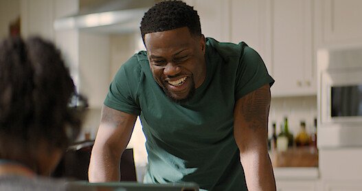 Watch Kevin Hart Shield His Kids from Mark Wahlberg’s Stories in ‘Me Time’ Clip