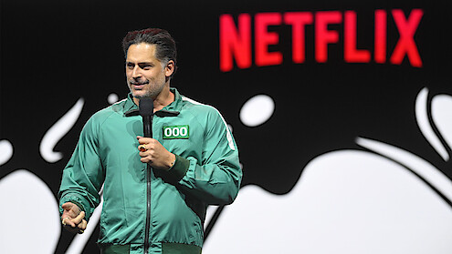 Joe Manganiello on stage in Squid Game costume.
