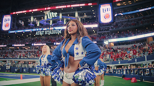 Armani on the sidelines during a game.