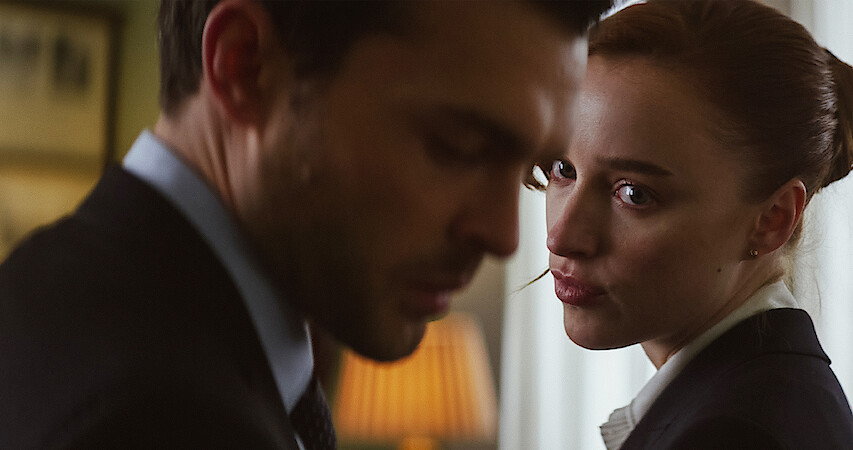 Phoebe Dynevor and Alden Ehrenreich touch foreheads in a still from their new movie 'Fair Play.'
