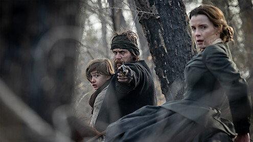 Taylor Kitsch and Betty Gilpin in 'American Primeval'.