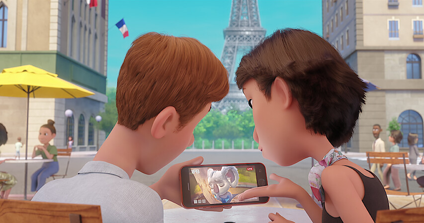 Two children watching Back to the Outback