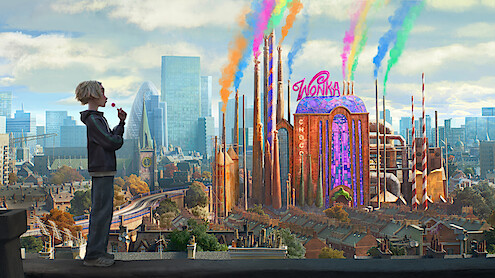 A child stands on a city rooftop overlooking a colorful, whimsical chocolate factory with rainbow smoke, surrounded by modern buildings and a bright sky.