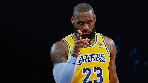 LeBron James points towards the camera.