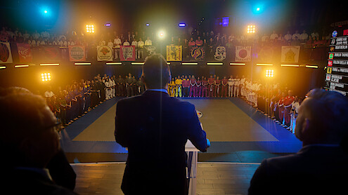 An announcer speaks at the Seikai Taikai in Season 6, Part 2 of 'Cobra Kai'