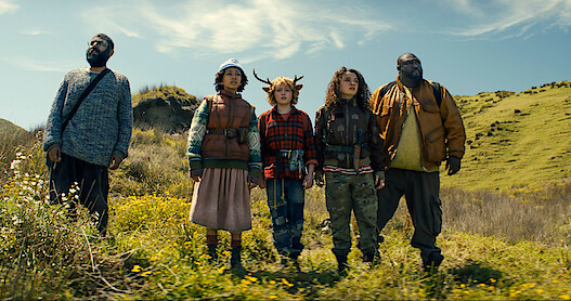 Adeel Akhtar as Singh, Naledi Murray as Wendy, Christian Convery as Gus, Stefania LaVie Owen as Becky, and Nonso Anozie as Jepperd stand on a mountainside together in season 3 of 'Sweet Tooth'