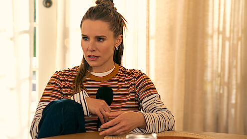 Kristen Bell as Joanne holds a microphone in 'Nobody Wants This' Season 2.