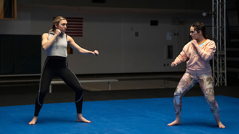 Peyton List as Tory Nichols and Mary Mouser as Samantha LaRusso in 'Cobra Kai' Season 6.