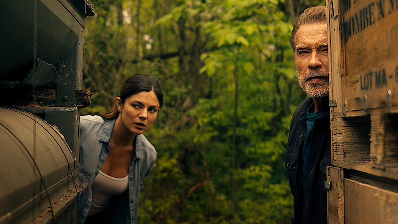 Monica Barbaro and Arnold Schwarzenegger in FUBAR.