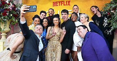 The cast and crew of Queen Charlotte at the red carpet premiere.
