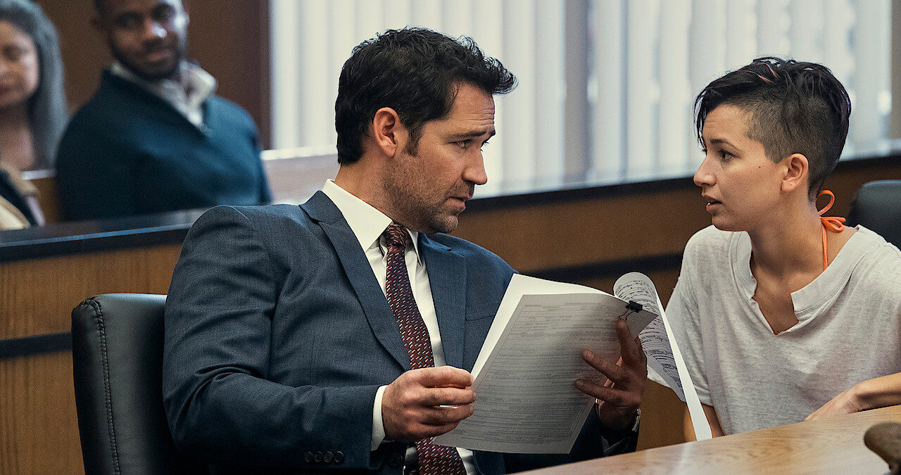 Mickey Haller with a client in 'The Lincoln Lawyer'