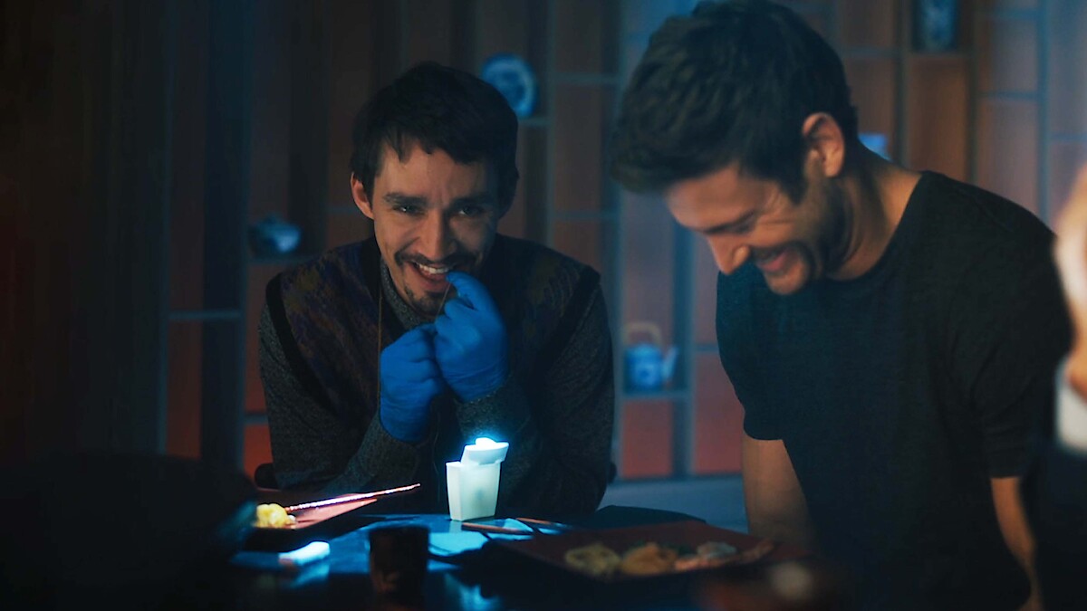 Robert Sheehan as Klaus and Tom Hopper as Luther laugh together in the bloopers for Season 4 of 'The Umbrella Academy'