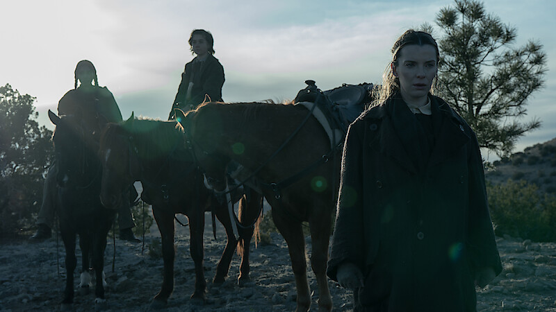 Shawnee Pourier as Two Moons, Preston Mota as Devin Rowell and Betty Gilpin as Sara Rowell in 'American Primeval'