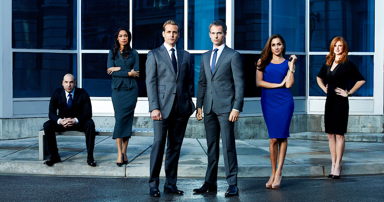 Rick Hoffman as Louis Litt, Gina Torres as Jessica Pearson, Gabriel Macht as Harvey Specter, Patrick J. Adams as Mike Ross, Meghan Markle as Rachel Zane, Sarah Rafferty as Donna Paulsen in Suits.