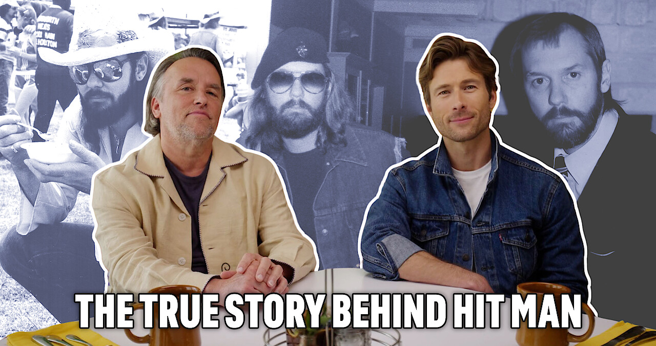 Richard Linklater, left, sitting at a diner table with Glen Powell. The backdrop is photos of the real Gary Johnson.