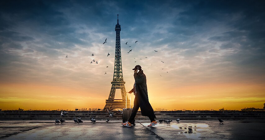 Omar Sy as Assane Diop walks though Paris in Season 3 of 'Lupin'