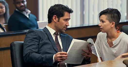 Mickey Haller with a client in 'The Lincoln Lawyer'