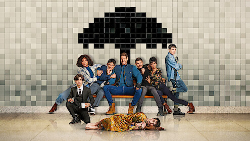 Photo of all Umbrella Academy characters sitting in the subway.