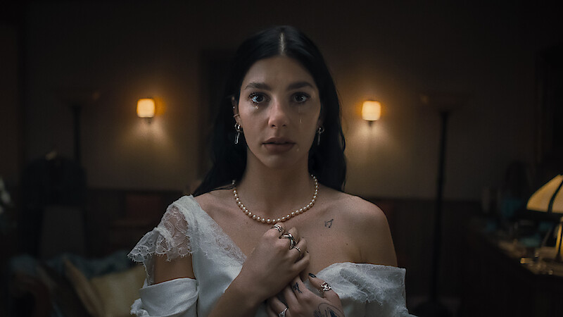 Camila Morrone as Rachel Harkin in 'Something Very Bad Is Going to Happen'