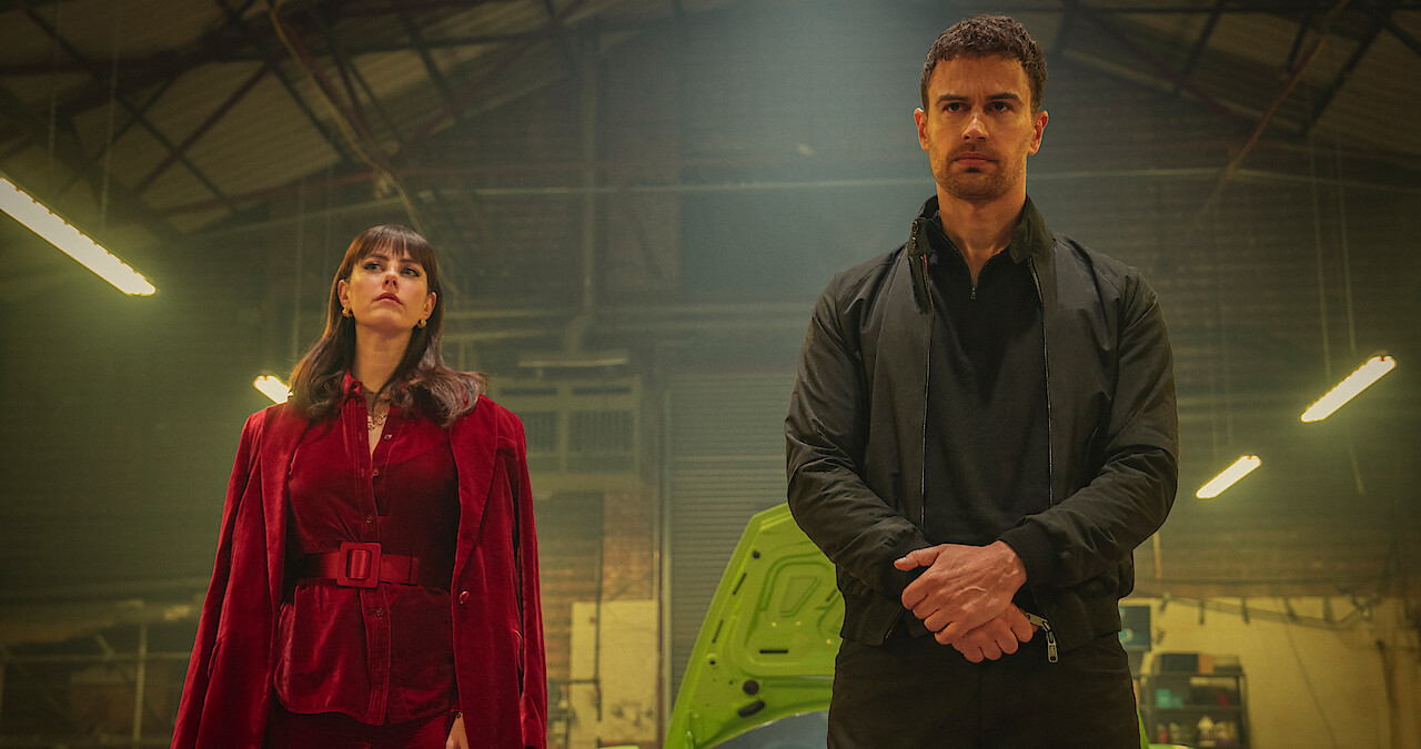 Theo James as Eddie Horniman stands in a garage in season 1 of 'The Gentlemen'