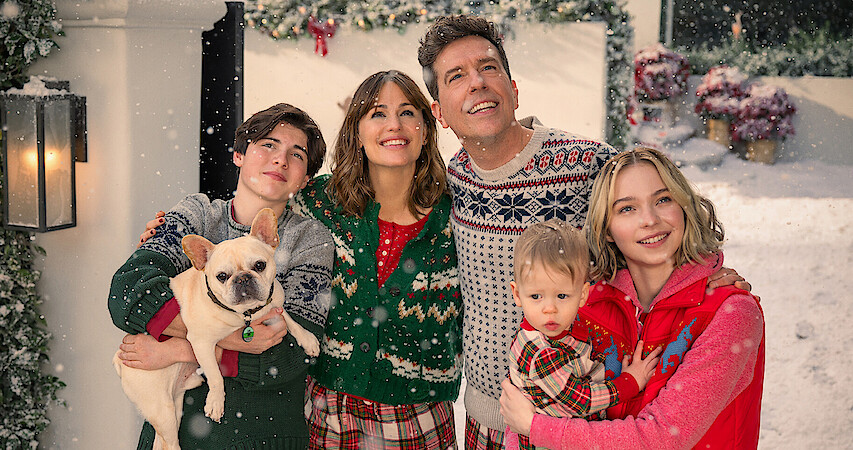 Brady Noon as Wyatt, Jennifer Garner as Jess, Ed Helms as Bill, Lincoln Alex Sykes and Theodore Brian Sykes as Baby Miles, and Emma Myers as CC in 'Family Switch.'