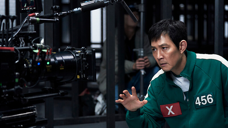 Lee Jung-jae as Seong Gi-hun filming on set in 'Squid Game' Season 2.
