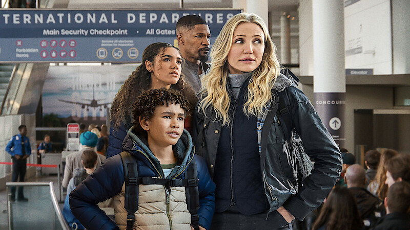 Rylan Jackson as Leo, McKenna Roberts as Alice, Jamie Foxx as Matt, and Cameron Diaz as Emily in 'Back In Action'.