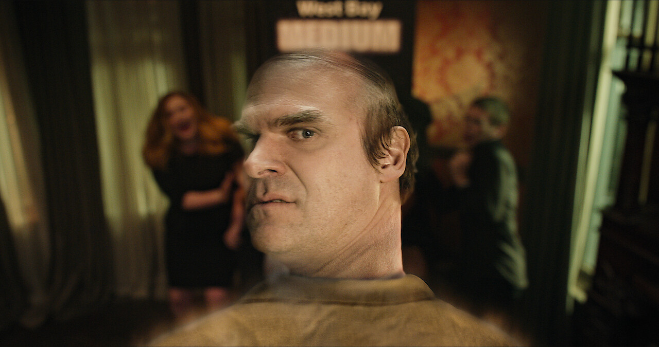 David Harbour as semi-translucent ghost, Ernest