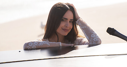 Watch ‘Purple Hearts’ Star Sofia Carson’s New Music Video for ‘Come Back Home’