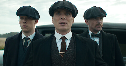 A close up of the Shelby brothers, John, Tommy and Arthur in 'Peaky Blinders'