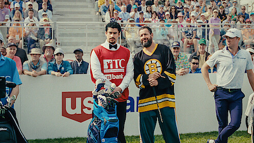 Quinn Stiller as Will Zalatoris Caddie, Benito Antonio Martínez Ocasio as Busboy, Adam Sandler as Happy Gilmore and Justin Thomas as himself in 'Happy Gilmore 2'