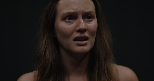 An image of a distressed looking Beth in The Weekend Away, played by Leighton Meester