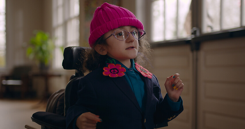 Esperanza in a pink hat