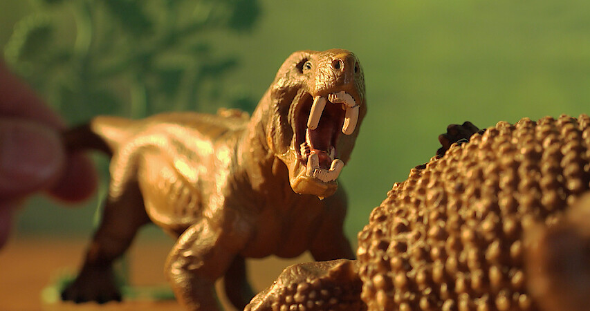 Miniature toy dinosaur