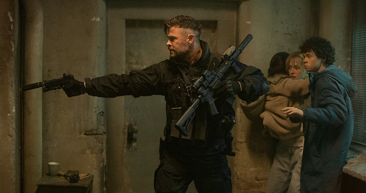 Chris Hemsworth as Tyler Rake, Miriam and Marta Kovziashvili as Nina, Tinatin Dalakishvili as Ketevan and Andro Jafaridze as Sandro in 'Extraction 2'.