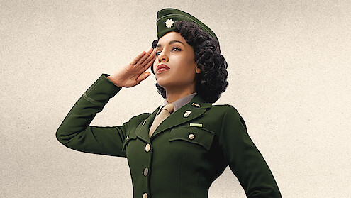Kerry Washington reports for duty in a green uniform and hat.