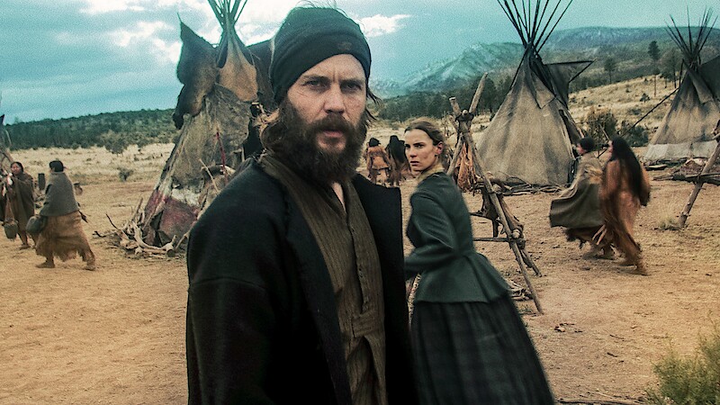 Taylor Kitsch as Issac and Betty Gilpin as Sara Rowell in 'American Primeval'